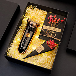 Engraved three-blade razor