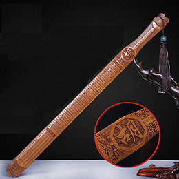 Bamboo ruler with inscriptions on it