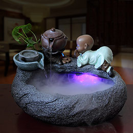 Đồ trang trí đài phun nước hình chú tiểu sư tử