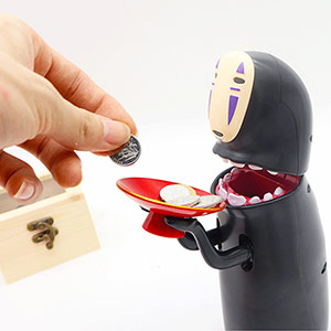 Faceless man eating money piggy bank