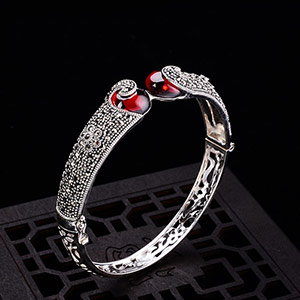 Hollow Thai silver and red garnet bracelet