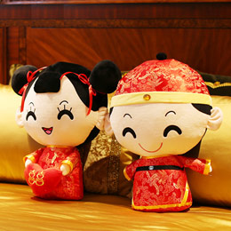 A pair of handsome man and beautiful woman wedding couple figurines