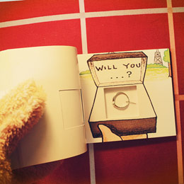 Creative flip book hole ring
