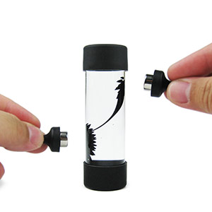 Magnetic fluid decompression toy bottle