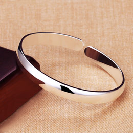 Polished silver open bracelet