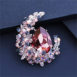 Moon-like crystal brooch