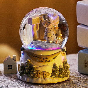 Rotating crystal ball music box