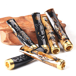Hand-carved filter cigarette holder