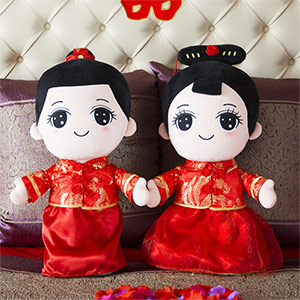 Golden boy and girl wedding couple doll