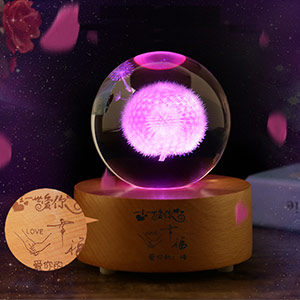 Glowing crystal ball music box