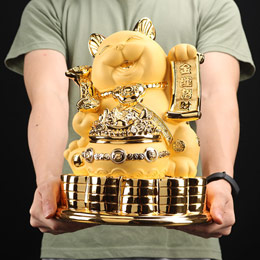 Large golden lucky cat figurine
