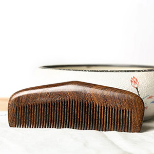 Natural gold sandalwood comb
