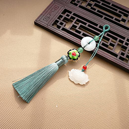 Peaceful lock lotus tassel brooch