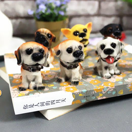 12 cute dog figurines
