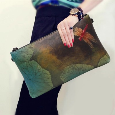 Ethnic style ladies leather clutch