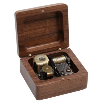 Wooden clockwork music box with engraving
