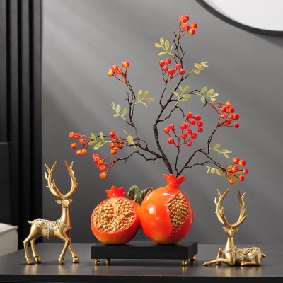 Pomegranate ornaments for fertility and good fortune