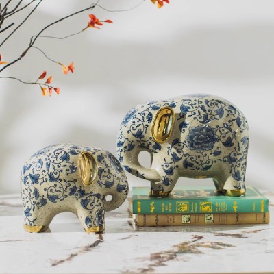 A pair of blue and white porcelain elephants