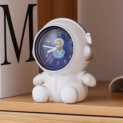 Cartoon astronaut clock piggy bank