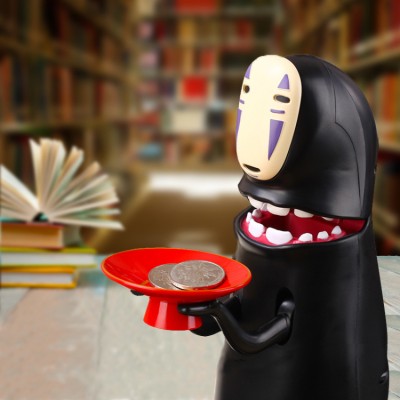 Faceless man eating money piggy bank