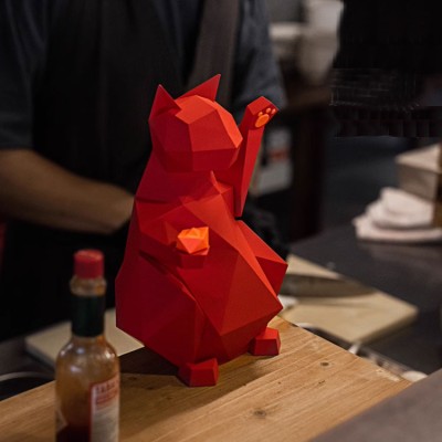 Automatic beckoning lucky cat ornament