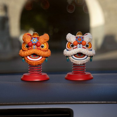 Shaking head lion car ornaments