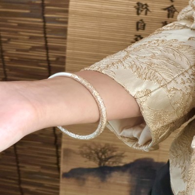 Silver bracelet with the Chinese character "福" (blessings and fortune)