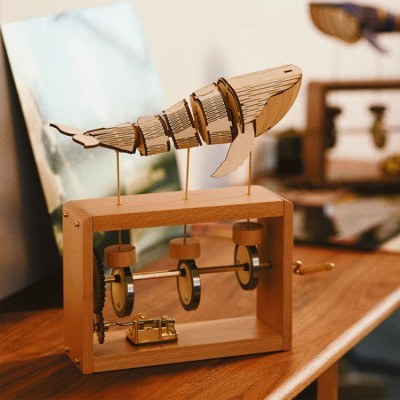 Hand crank whale mechanical music box