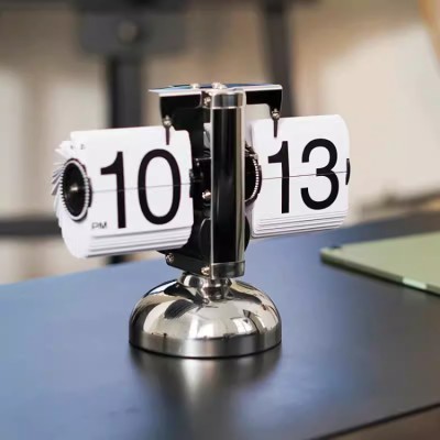 Automatic page turning mechanical alarm clock