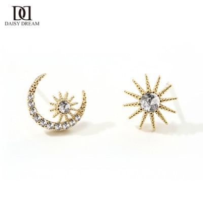 Asymmetric star and moon diamond earrings