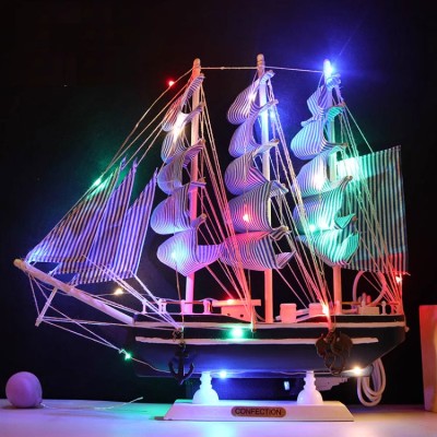 Smooth sailing solid wood sailboat model