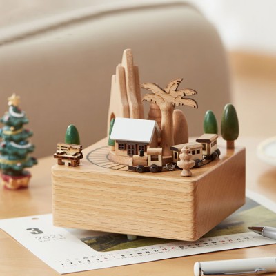 Automatic rotating train music box